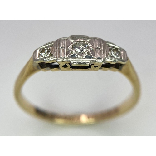 122 - An ART DECO 9 K yellow gold and platinum ring with a trilogy of round cut diamonds. Size: L, weight:... 