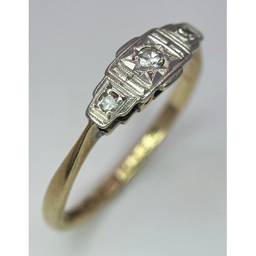 122 - An ART DECO 9 K yellow gold and platinum ring with a trilogy of round cut diamonds. Size: L, weight:... 