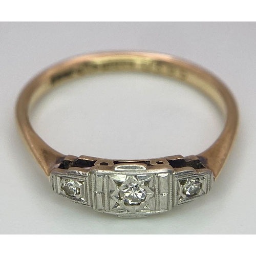 122 - An ART DECO 9 K yellow gold and platinum ring with a trilogy of round cut diamonds. Size: L, weight:... 