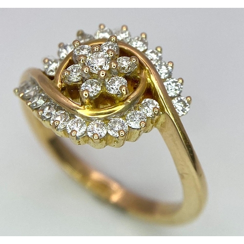 304 - An attractive 14K Yellow Gold (tested as) Diamond Swirl Ring, 0.55ct diamond weight, 4.6g total weig... 