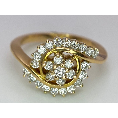 304 - An attractive 14K Yellow Gold (tested as) Diamond Swirl Ring, 0.55ct diamond weight, 4.6g total weig... 