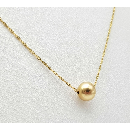 325 - 18K Yellow Gold (tested as) Ball Necklace, 2.2g total weight, 20” chain length