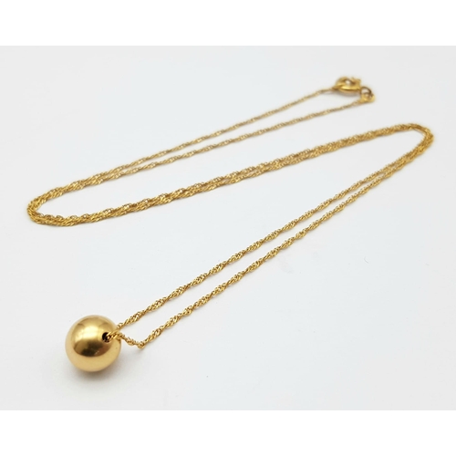 325 - 18K Yellow Gold (tested as) Ball Necklace, 2.2g total weight, 20” chain length