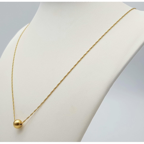 325 - 18K Yellow Gold (tested as) Ball Necklace, 2.2g total weight, 20” chain length