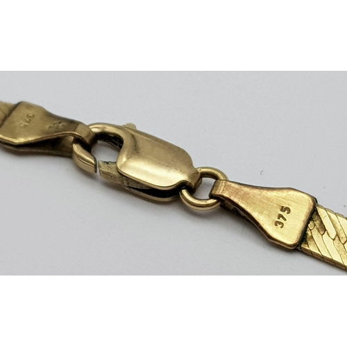65 - An Italian 9K Yellow Gold Herringbone Necklace. 40cm. 4.6g weight.