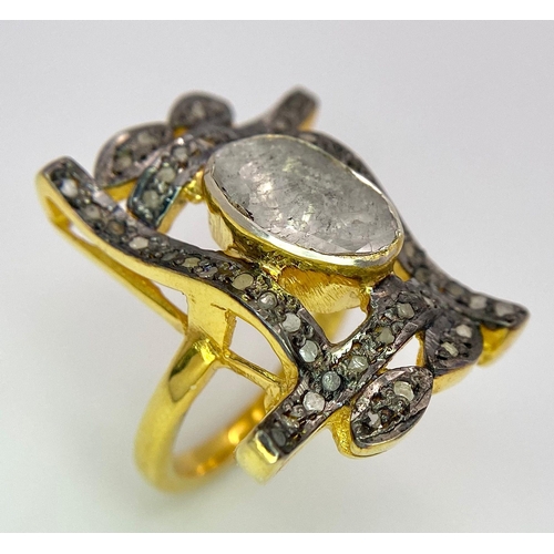 154 - A spectacular, antique silver and gold ring with a large natural, old cut diamond (2.80 carats appr.... 