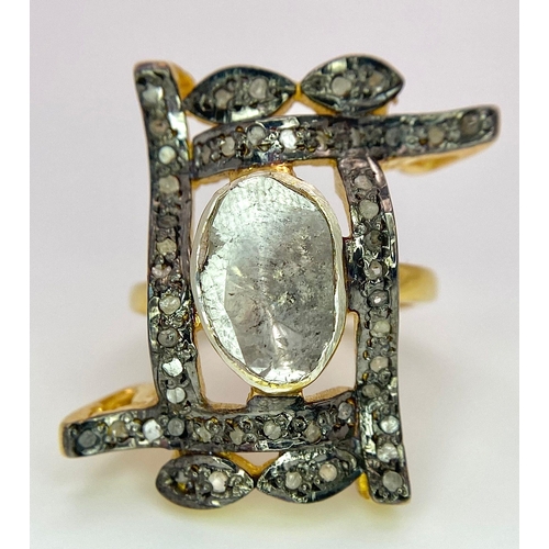 154 - A spectacular, antique silver and gold ring with a large natural, old cut diamond (2.80 carats appr.... 