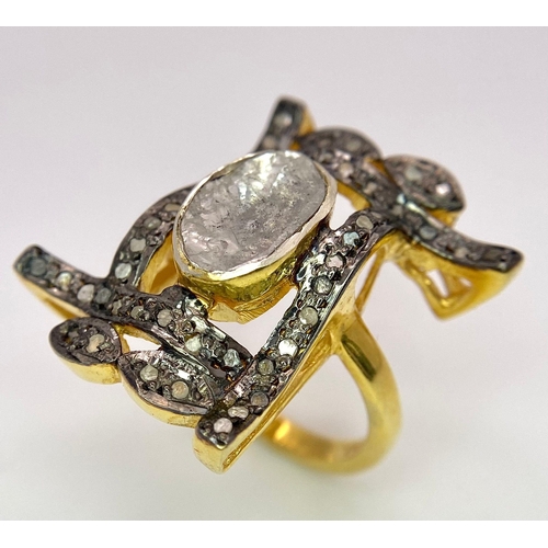 154 - A spectacular, antique silver and gold ring with a large natural, old cut diamond (2.80 carats appr.... 