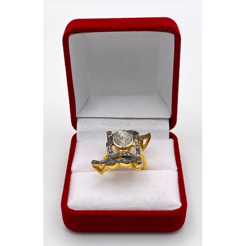 154 - A spectacular, antique silver and gold ring with a large natural, old cut diamond (2.80 carats appr.... 