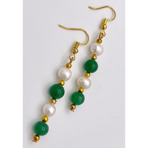 259 - A stunning, three row necklace of alternating green jade and natural white pearls from South Pacific... 