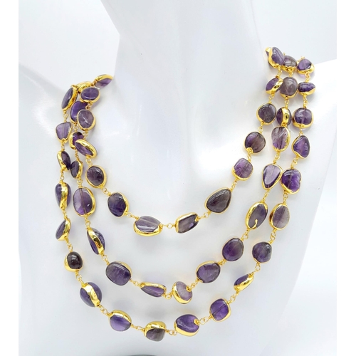 287 - A very attractive three row gilded amethyst necklace and bracelet. Necklace length: 44-52 cm, bracel... 