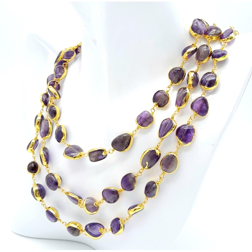 287 - A very attractive three row gilded amethyst necklace and bracelet. Necklace length: 44-52 cm, bracel... 