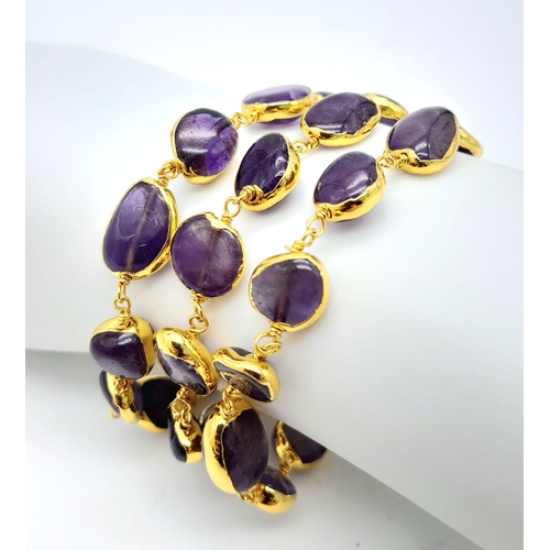 287 - A very attractive three row gilded amethyst necklace and bracelet. Necklace length: 44-52 cm, bracel... 