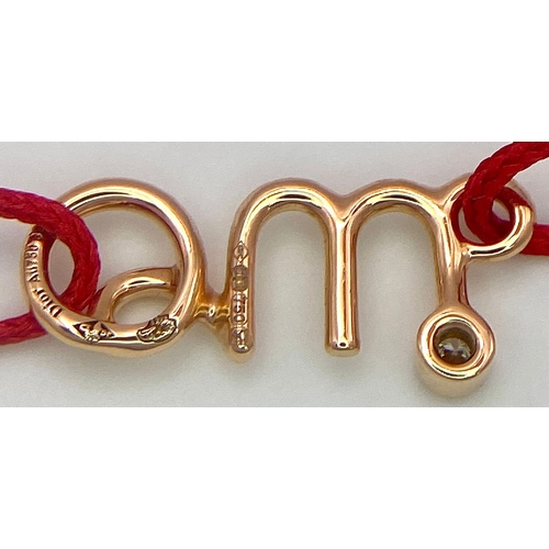 355 - A Christian Dior 18K Gold and Diamond 'Oui' Bracelet. Comes with original Dior packaging. Ref: 01663... 