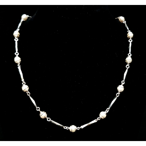 252 - A truly elegant, silver and 14 K white gold plated, Mallorca pearl necklace, bracelet and earrings s... 