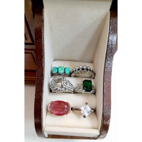 294 - A mini jewellery box with a selection of precious and semiprecious stone sets including lapis lazuli... 