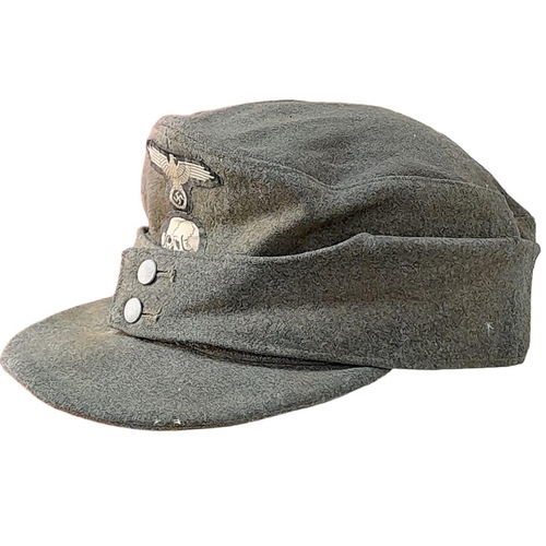 83 - 3rd Reich Waffen SS M43 Cap. very small cut on the top. A real “Been There” item.