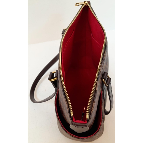 102 - A Louis Vuitton Damier Ebene 'Totally PM' Shoulder Bag. Leather exterior with gold-toned hardware, t... 