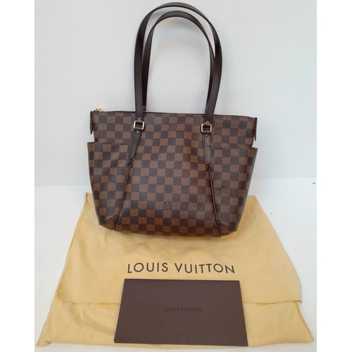 102 - A Louis Vuitton Damier Ebene 'Totally PM' Shoulder Bag. Leather exterior with gold-toned hardware, t... 