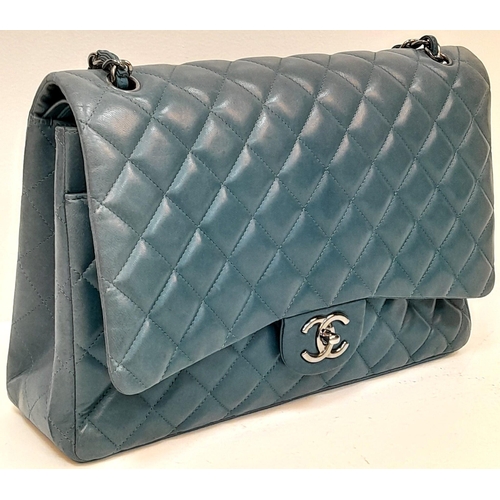 18 - A Chanel Teal Jumbo Classic Double Flap Bag. Quilted leather exterior with silver-toned hardware, ch... 