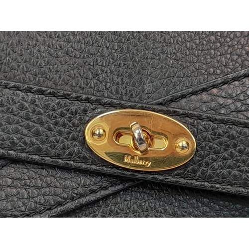 206 - A Mulberry Bayswater Leather Handbag. Textured black leather exterior with gold tone hardware. Remov... 