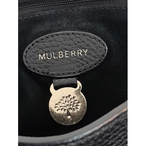 227 - A Mulberry Black 'Lily' Bag. Leather exterior with gold-toned hardware, chain and leather strap, pad... 