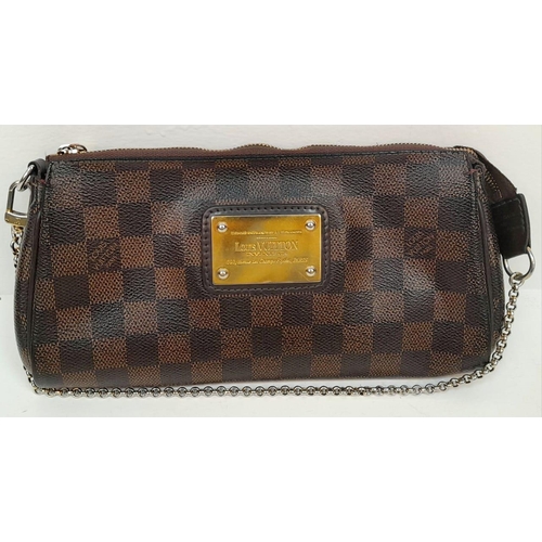 283 - A Louis Vuitton Damier Ebene 'Eva' Pochette Shoulder Bag. Leather exterior with gold-toned hardware,... 