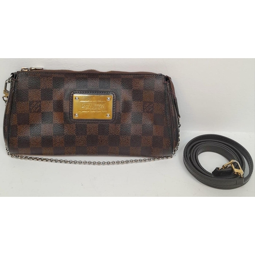 283 - A Louis Vuitton Damier Ebene 'Eva' Pochette Shoulder Bag. Leather exterior with gold-toned hardware,... 