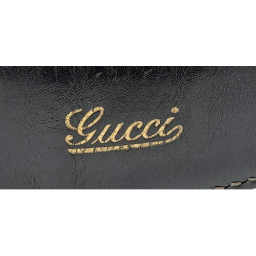 290 - A Gucci Brown Jackie Bag. Leather exterior with gold-toned hardware, adjustable strap and push lock ... 