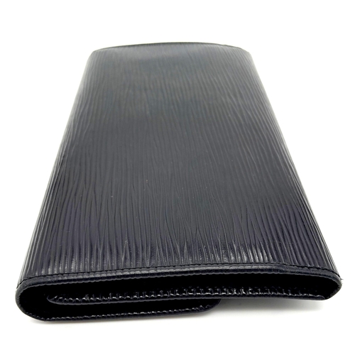 298 - A Louis Vuitton Black 'Sarah' Wallet. Epi leather exterior with the LV logo and press stud closure. ... 