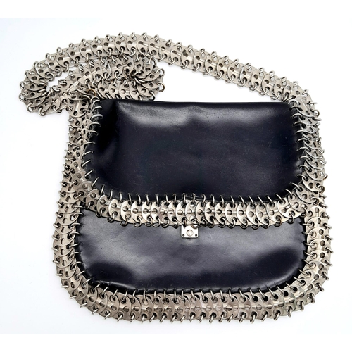 326 - A Paco Rabanne Black 69 Chain Bag. Leather exterior with silver-toned perforated steel discs linked ... 