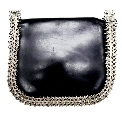 326 - A Paco Rabanne Black 69 Chain Bag. Leather exterior with silver-toned perforated steel discs linked ... 