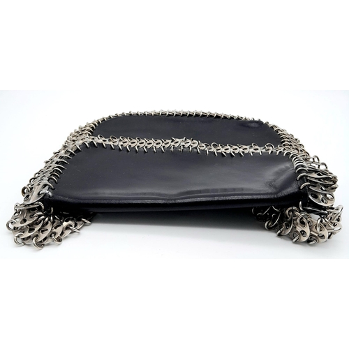 326 - A Paco Rabanne Black 69 Chain Bag. Leather exterior with silver-toned perforated steel discs linked ... 