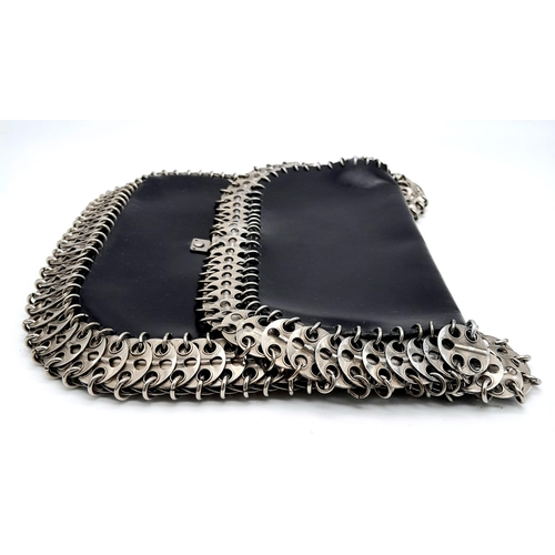 326 - A Paco Rabanne Black 69 Chain Bag. Leather exterior with silver-toned perforated steel discs linked ... 