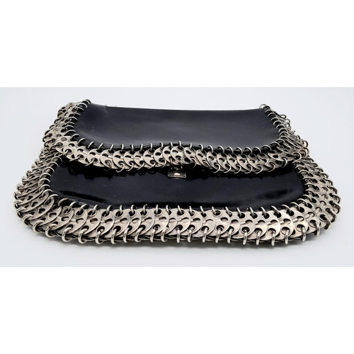 326 - A Paco Rabanne Black 69 Chain Bag. Leather exterior with silver-toned perforated steel discs linked ... 