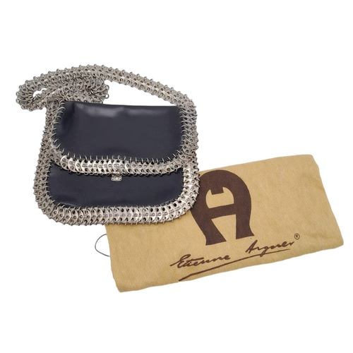 326 - A Paco Rabanne Black 69 Chain Bag. Leather exterior with silver-toned perforated steel discs linked ... 