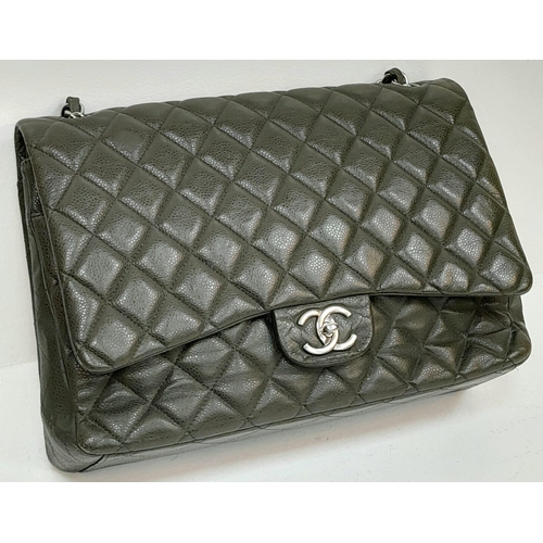 60 - A Chanel Green Jumbo Classic Double Flap Bag. Quilted leather exterior with silver-toned hardware, c... 