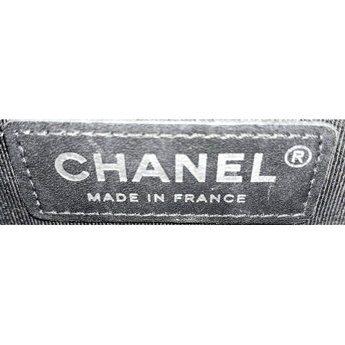 67 - A Chanel Black Leather Boy Bag. Chevron decorative soft black leather with an antique style/finish C... 