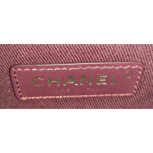 74 - A Chanel Neo Executive Leather Tote Bag. Burgundy leather exterior with gold tone hardware and two l... 