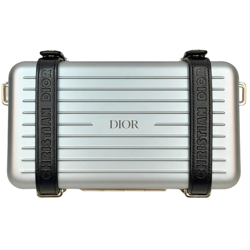 95 - A Christian Dior x Rimowa Collaboration Ice Blue Clutch Bag. Aluminium exterior with silver-toned ha... 