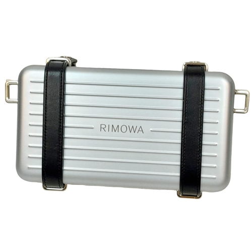 95 - A Christian Dior x Rimowa Collaboration Ice Blue Clutch Bag. Aluminium exterior with silver-toned ha... 