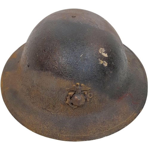 152 - WW1 US Brodie Helmet with USMC Cap Badge and Camo Paint Job. The liner is complete, alas the chin st... 