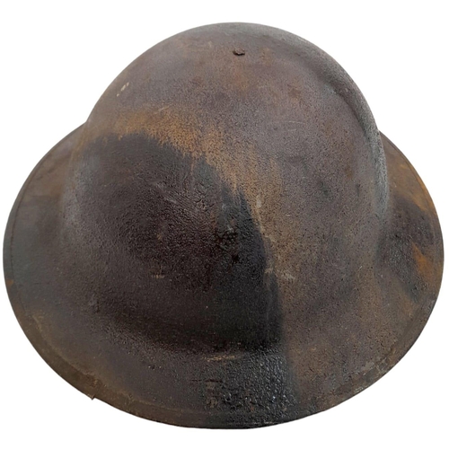 152 - WW1 US Brodie Helmet with USMC Cap Badge and Camo Paint Job. The liner is complete, alas the chin st... 