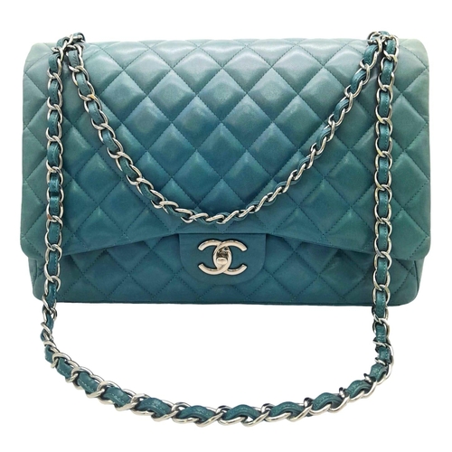 18 - A Chanel Teal Jumbo Classic Double Flap Bag. Quilted leather exterior with silver-toned hardware, ch... 