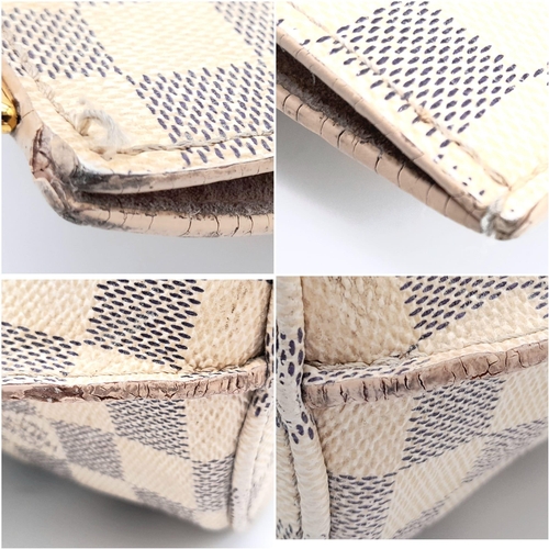 276 - A Louis Vuitton Damier Azur Girolata Bag. Leather exterior with gold-toned hardware, 2 rolled leathe... 