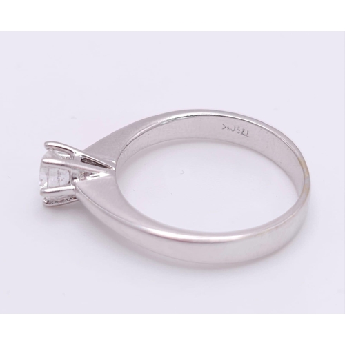89 - AN 18K WHITE GOLD DIAMOND SOLITAIRE RING - 0.50CT. 6 CLAW SETTING. 3.9G. SIZE N