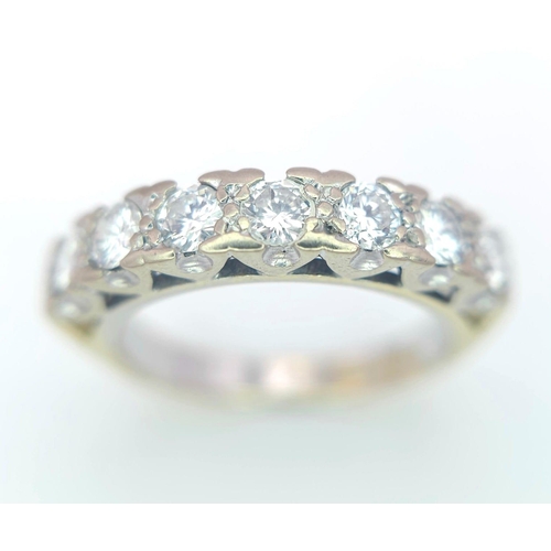 163 - An 18K Yellow Gold Diamond Half Eternity Ring. 0.70ctw, Size J1/2, 3.6g total weight. Ref: 8451