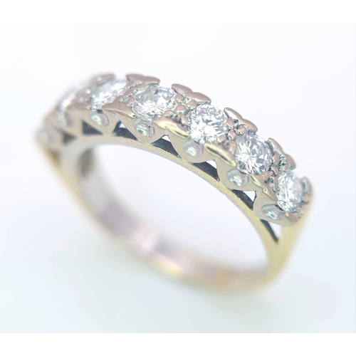 163 - An 18K Yellow Gold Diamond Half Eternity Ring. 0.70ctw, Size J1/2, 3.6g total weight. Ref: 8451