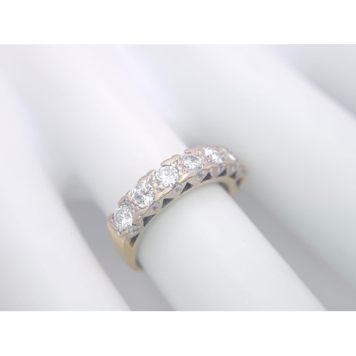 163 - An 18K Yellow Gold Diamond Half Eternity Ring. 0.70ctw, Size J1/2, 3.6g total weight. Ref: 8451