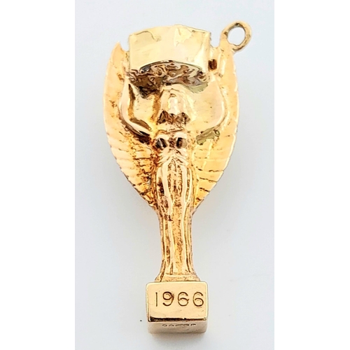 219 - A 9K Yellow Gold World Cup Charm/Pendant, Old Jules Rimet Trophy. 3.5cm length, 5.7g weight. Ref: SC... 